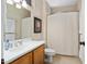 Clean bathroom with shower/tub combo and updated vanity at 16938 W Desert Rose Ln, Surprise, AZ 85387
