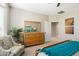Bedroom with comfortable seating and large windows at 16938 W Desert Rose Ln, Surprise, AZ 85387