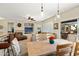 Bright dining area with wood table and turquoise accents at 16938 W Desert Rose Ln, Surprise, AZ 85387