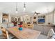 Open dining area with a view of the living room and kitchen at 16938 W Desert Rose Ln, Surprise, AZ 85387