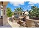Outdoor kitchen with grill and stone countertops at 16938 W Desert Rose Ln, Surprise, AZ 85387