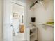 Bathroom with toilet, linen closet, and shelves at 2064 S Farnsworth Dr # 39, Mesa, AZ 85209