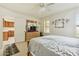 Bedroom with dresser, TV, and view of kitchen at 2064 S Farnsworth Dr # 39, Mesa, AZ 85209