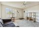 Living room with two sofas, a ceiling fan, and tiled floor at 2064 S Farnsworth Dr # 39, Mesa, AZ 85209
