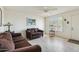 Living room with two sofas, a ceiling fan, and tiled floor at 2064 S Farnsworth Dr # 39, Mesa, AZ 85209