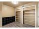 Hallway with shelving and built-in storage at 22765 N Rayo De Sol Ct, Kearny, AZ 85137