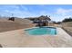 Inviting kidney-shaped pool with mountain views at 22765 N Rayo De Sol Ct, Kearny, AZ 85137