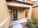 Modern front door entrance with glass panels and a small covered porch at 2565 E Southern Ave # 15, Mesa, AZ 85204