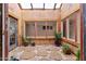 Relaxing courtyard with flagstone patio and potted plants at 2835 N 77Th Pl, Scottsdale, AZ 85257