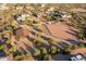 Aerial view of property with arena, barn, and surrounding landscape at 30316 N 139Th St, Scottsdale, AZ 85262