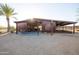 Spacious barn with covered stalls and a sitting area at 30316 N 139Th St, Scottsdale, AZ 85262