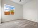 Cozy bedroom with carpet flooring and window at 3402 W Zuni Brave Trl, Phoenix, AZ 85086