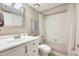 Bathroom with tub, shower, and white vanity at 3716 E University Dr # 2014, Mesa, AZ 85205
