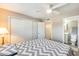 Bedroom with queen bed, closet, and en-suite bathroom at 3716 E University Dr # 2014, Mesa, AZ 85205