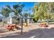 Community picnic area with tables and BBQ grills at 3716 E University Dr # 2014, Mesa, AZ 85205