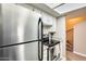 Stainless steel appliances in galley-style kitchen at 3716 E University Dr # 2014, Mesa, AZ 85205