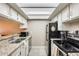 Galley-style kitchen with granite countertops at 3716 E University Dr # 2014, Mesa, AZ 85205