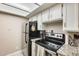 View of kitchen with stainless steel appliances at 3716 E University Dr # 2014, Mesa, AZ 85205