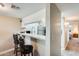 Kitchen with breakfast bar, granite counters, and view of hallway at 3716 E University Dr # 2014, Mesa, AZ 85205