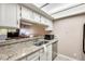 Kitchen features granite countertops and stainless steel sink at 3716 E University Dr # 2014, Mesa, AZ 85205