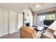 Living room with fireplace, vaulted ceiling and access to balcony at 3716 E University Dr # 2014, Mesa, AZ 85205