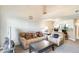 Living area with open concept kitchen and comfortable seating at 3716 E University Dr # 2014, Mesa, AZ 85205