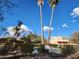 Community pool with surrounding landscaping and building views at 37801 N Cave Creek Rd # 13, Cave Creek, AZ 85331