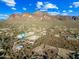 Aerial view of property with desert landscape and mountain backdrop at 5581 E Superstition Blvd, Apache Junction, AZ 85119