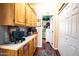 Well-lit hallway featuring built-in storage and access to other rooms at 650 N Hawes Rd # 2840, Mesa, AZ 85207