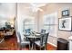 Cozy kitchen nook with a round table and four chairs at 650 N Hawes Rd # 2840, Mesa, AZ 85207