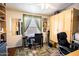 Home office with built-in shelving and a comfortable chair at 650 N Hawes Rd # 2840, Mesa, AZ 85207