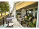 Covered patio with comfortable seating area and golf course view at 650 N Hawes Rd # 2840, Mesa, AZ 85207