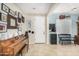 Bright entryway with piano, bench, and coat rack at 926 W Ayrshire Trl, San Tan Valley, AZ 85143