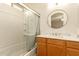 Clean bathroom with a bathtub, shower, and updated vanity at 11511 N 80Th Dr, Peoria, AZ 85345