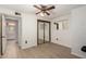 Bedroom with mirrored closet doors and a view of the bathroom at 14029 N 32Nd Pl, Phoenix, AZ 85032