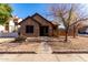 Cute one-story house with a well-maintained front yard at 16501 N 68Th Dr, Peoria, AZ 85382