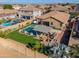 Spacious backyard with a refreshing pool and spa at 18696 N Tanners Way, Maricopa, AZ 85138