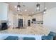 Stylish kitchen island with granite countertop and pendant lighting at 18696 N Tanners Way, Maricopa, AZ 85138