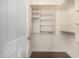 Walk-in closet with shelves and hanging rods at 18884 N 98Th St, Scottsdale, AZ 85255