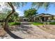 House exterior with a landscaped lawn and driveway at 18884 N 98Th St, Scottsdale, AZ 85255