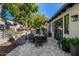 Patio with dining table and chairs, lush landscaping at 18884 N 98Th St, Scottsdale, AZ 85255