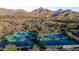 Aerial view of multiple tennis courts in a community at 18884 N 98Th St, Scottsdale, AZ 85255