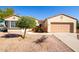 One-story house with a two-car garage and desert landscaping at 21067 N Sequoia Crest N Dr, Surprise, AZ 85387