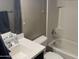 Clean bathroom with a tub, toilet, and single vanity at 2150 W Alameda Rd # 2139, Phoenix, AZ 85085