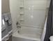 Bathroom with bathtub, shower, and gray towels at 2150 W Alameda Rd # 2139, Phoenix, AZ 85085