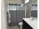 Bathroom with single vanity, shower, and gray towels at 2150 W Alameda Rd # 2139, Phoenix, AZ 85085