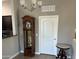 Dining area with grandfather clock and marble-top side table at 2150 W Alameda Rd # 2139, Phoenix, AZ 85085