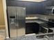 Stainless steel refrigerator and dark kitchen cabinets at 2150 W Alameda Rd # 2139, Phoenix, AZ 85085