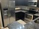 Kitchen features stainless steel appliances and granite countertops at 2150 W Alameda Rd # 2139, Phoenix, AZ 85085