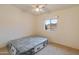 Bedroom with a queen bed and ceiling fan at 2221 E Joy Ranch Rd, Phoenix, AZ 85086